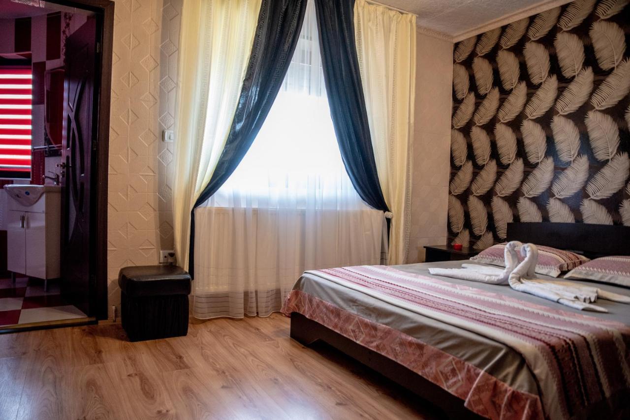 Отель Casa Robi Pestisani Экстерьер фото